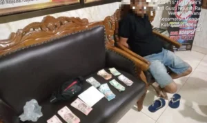 upal Uang palsu, Pasar Mengwi, Badung, Polres Badung, Polsek Mengwi, pria 53 tahun, uang diduga palsu, pecahan Rp100 ribu, 98 lembar uang, belanja pasar, Desa Beraban, Tabanan, kriminal, kasus uang palsu.