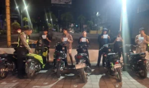 Satlantas Polresta Denpasar, patroli hunting system, Blue Light Patrol, balap liar, knalpot brong, pelanggaran lalu lintas, 26 sepeda motor, TNKB, Sunset Road, Bypass Ngurah Rai, Suwung Kauh, Denpasar, Kuta, Polresta Denpasar, Kamseltibcarlantas, lalu lintas Bali.