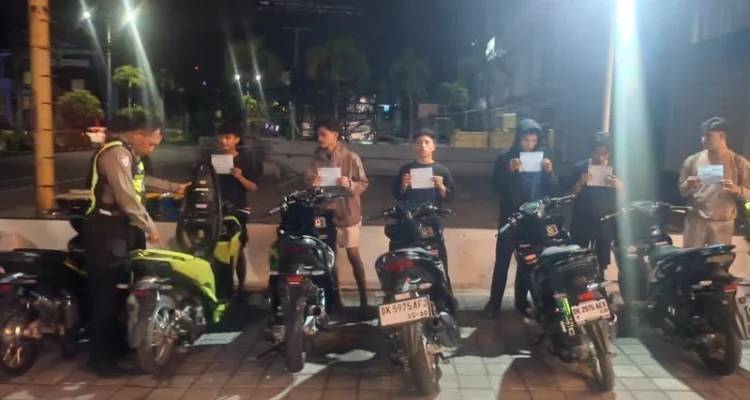 Satlantas Polresta Denpasar, patroli hunting system, Blue Light Patrol, balap liar, knalpot brong, pelanggaran lalu lintas, 26 sepeda motor, TNKB, Sunset Road, Bypass Ngurah Rai, Suwung Kauh, Denpasar, Kuta, Polresta Denpasar, Kamseltibcarlantas, lalu lintas Bali.