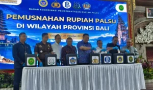 Polda Bali, Bank Indonesia Bali, uang Rupiah palsu, pemusnahan uang palsu, 3.731 lembar uang palsu, Wisnu Prabowo, Achris Sarwani, Gedung Presisi Polda Bali, peredaran uang palsu Bali.