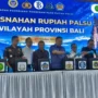 Polda Bali, Bank Indonesia Bali, uang Rupiah palsu, pemusnahan uang palsu, 3.731 lembar uang palsu, Wisnu Prabowo, Achris Sarwani, Gedung Presisi Polda Bali, peredaran uang palsu Bali.