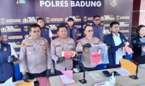 Polres Badung, 21 tersangka, pengungkapan kasus kriminal, penganiayaan berat Kuta Utara, pembakaran mesin perontok padi, Subak Blakiu, Subak Mambal, Sangeh, AKBP Joseph Edward Purba, kriminalitas Badung.